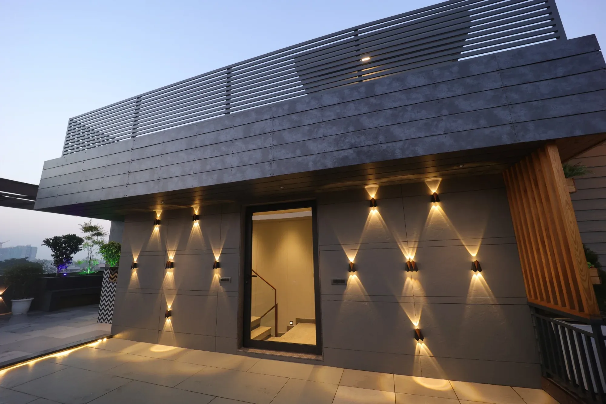 UDC Interiors terrace facade project at dusk